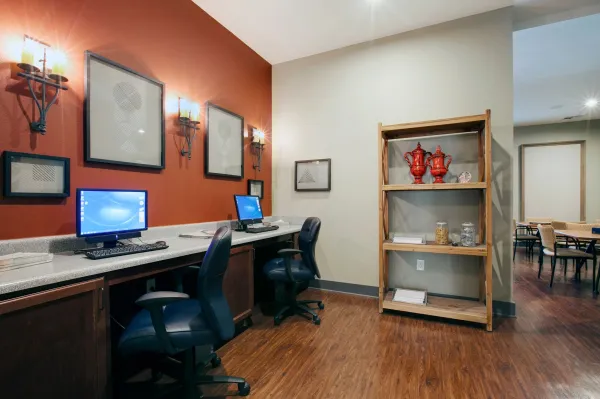 The community business center with computers and a printer